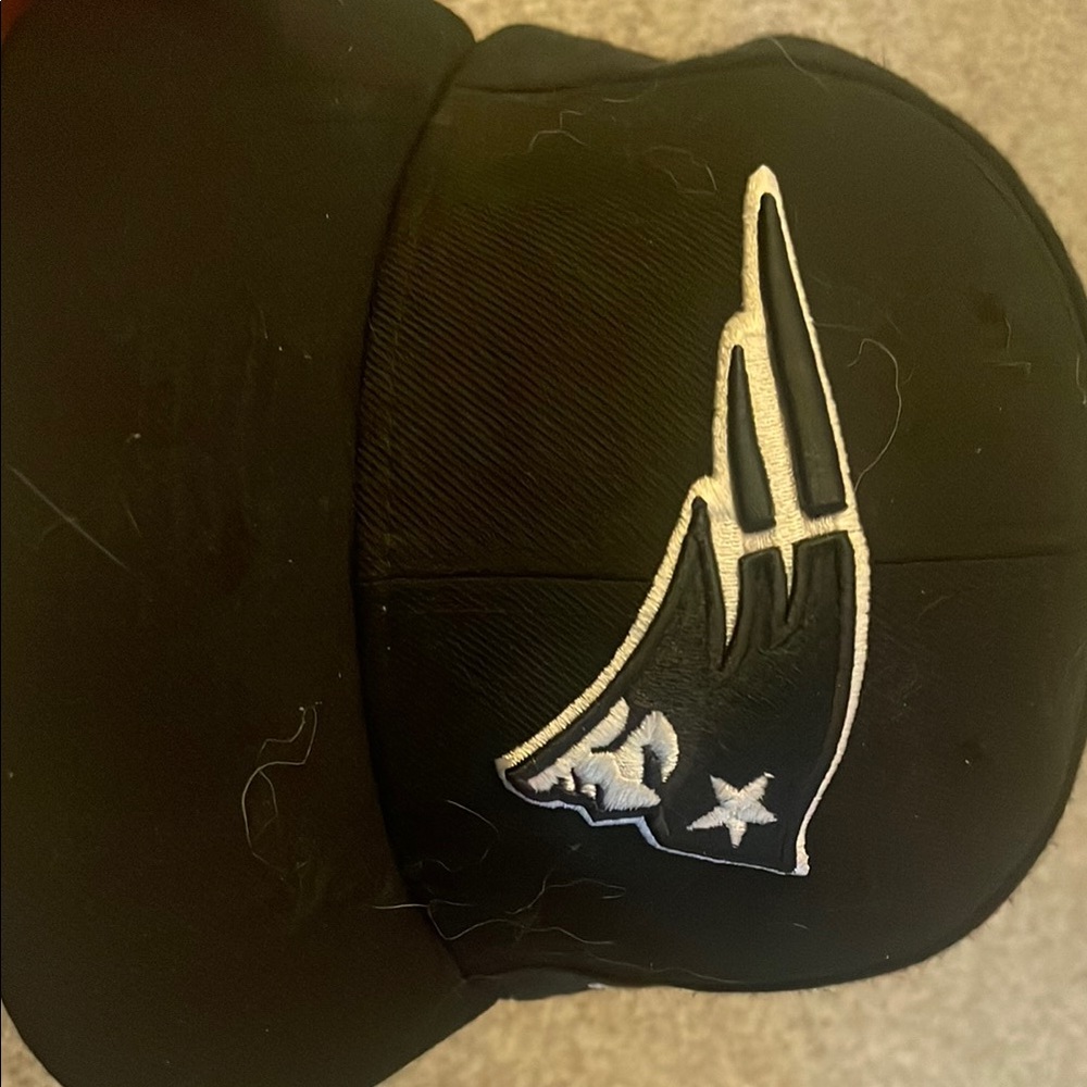 Black fitted New England Patriots flat brim hat